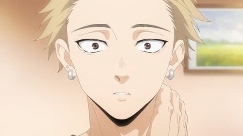 Cheveux blonds et boucles d'oreilles